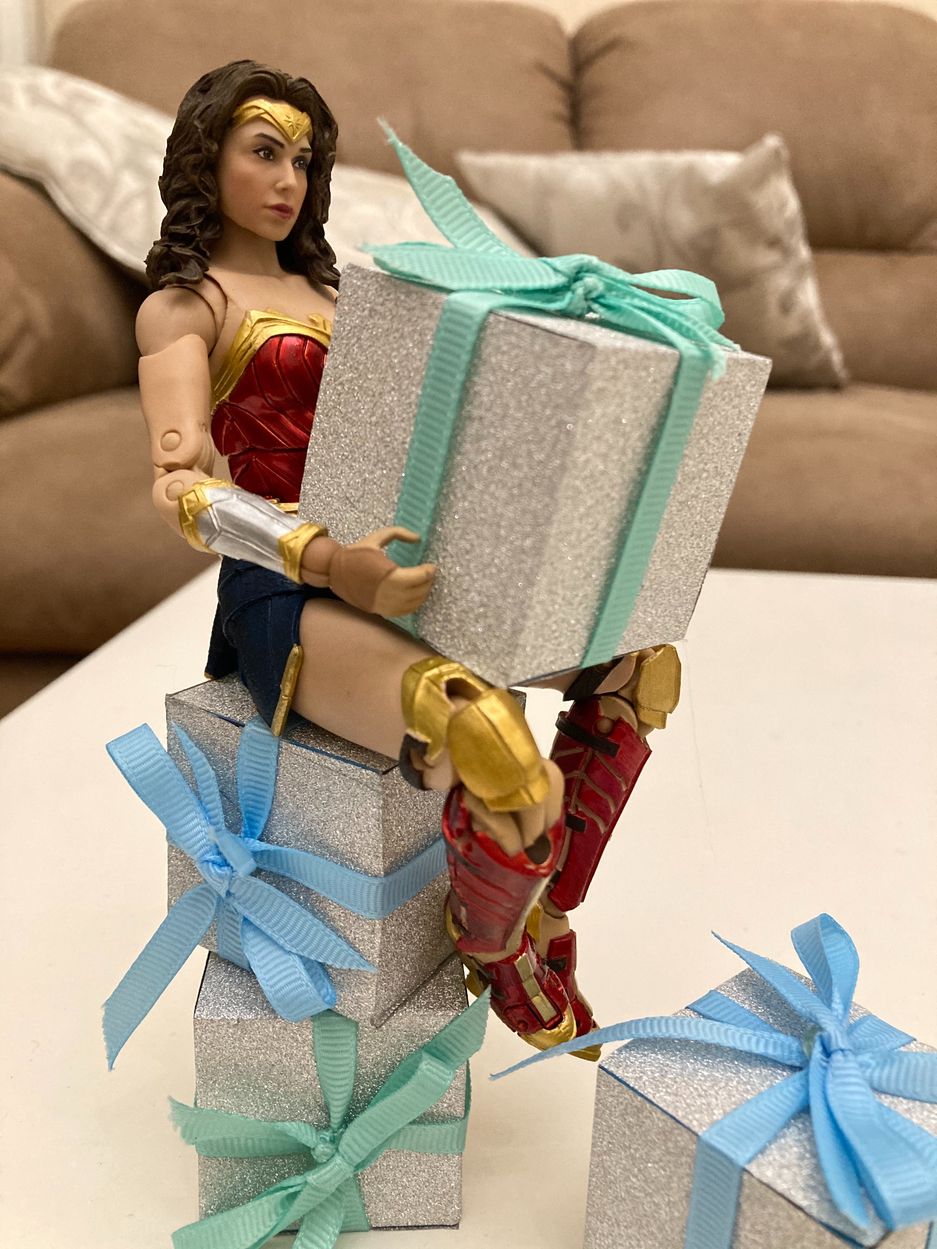 Wonder woman holding a gift