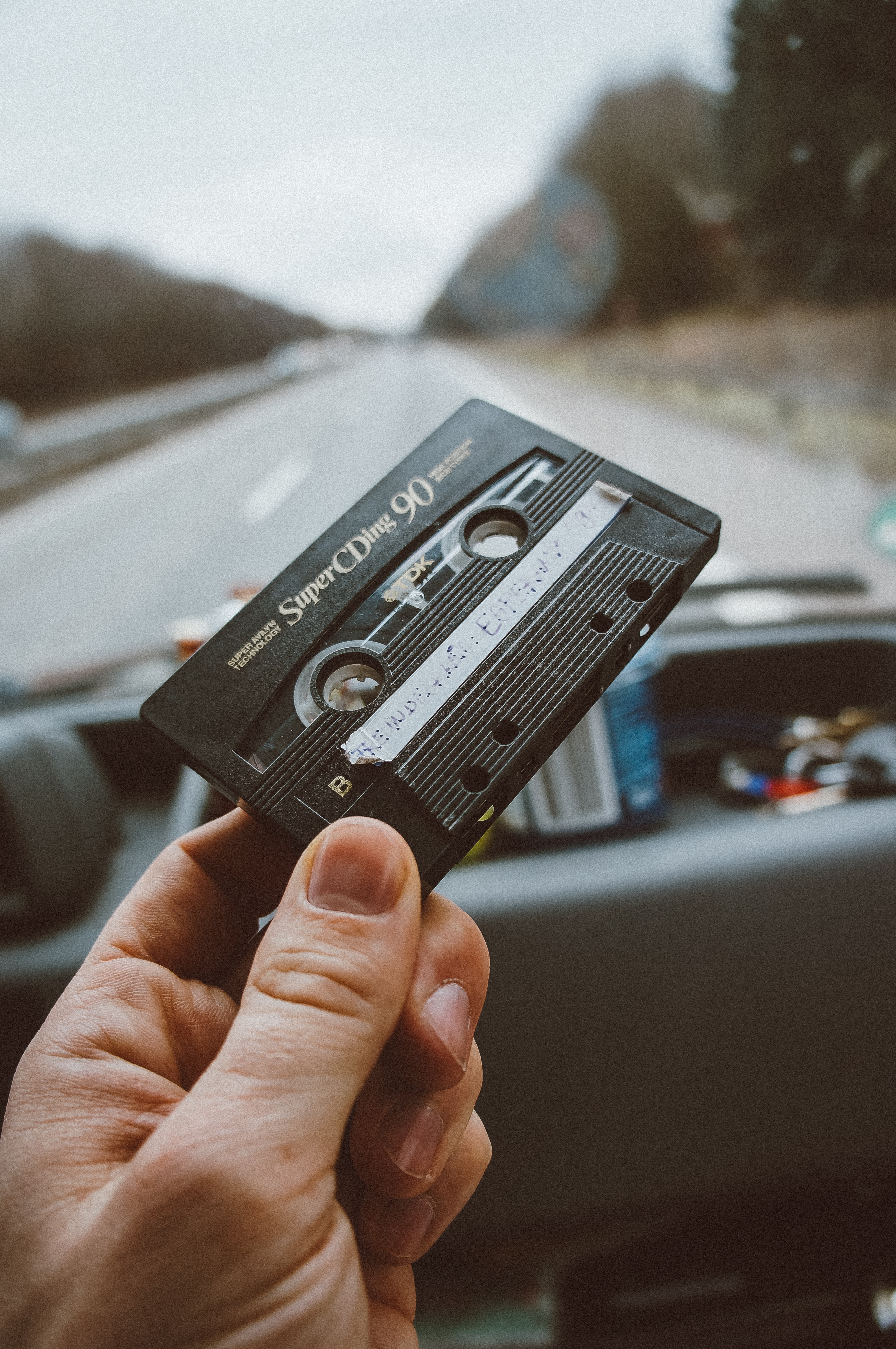 Picture of an old cassette during a road trip